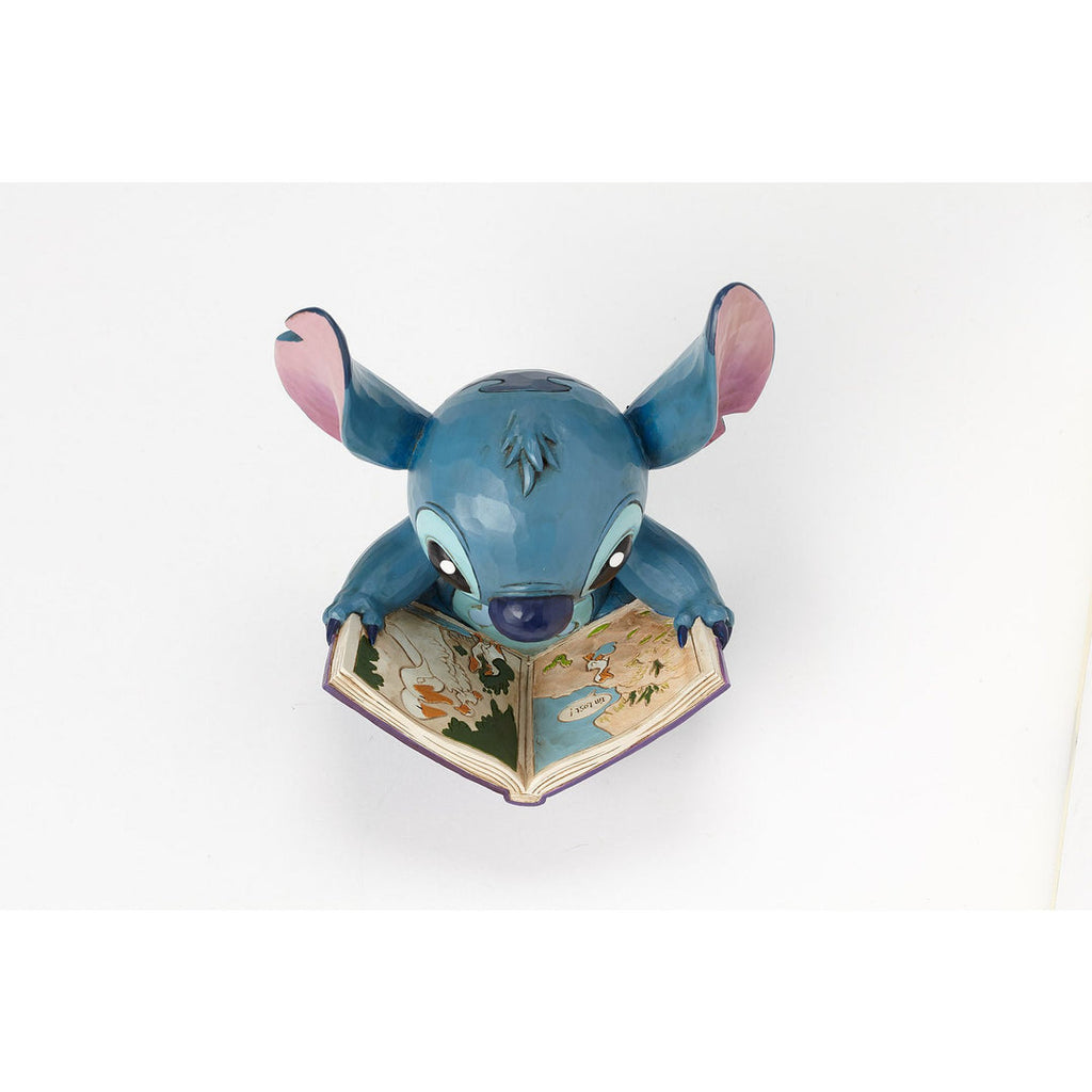 Stitch reading The Ugly Duckling figurine side detail