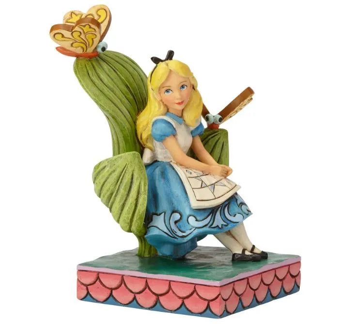 Alice Curiouser and Curiouser figurine side view