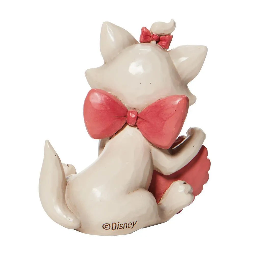 Marie Holding Heart figurine angled view