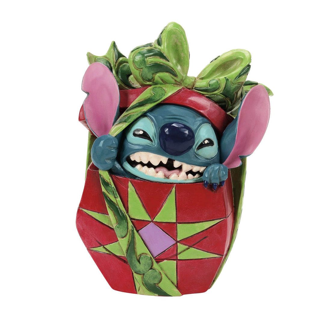 Jim Shore Disney Traditions Stitch Tearing Present figurine front view