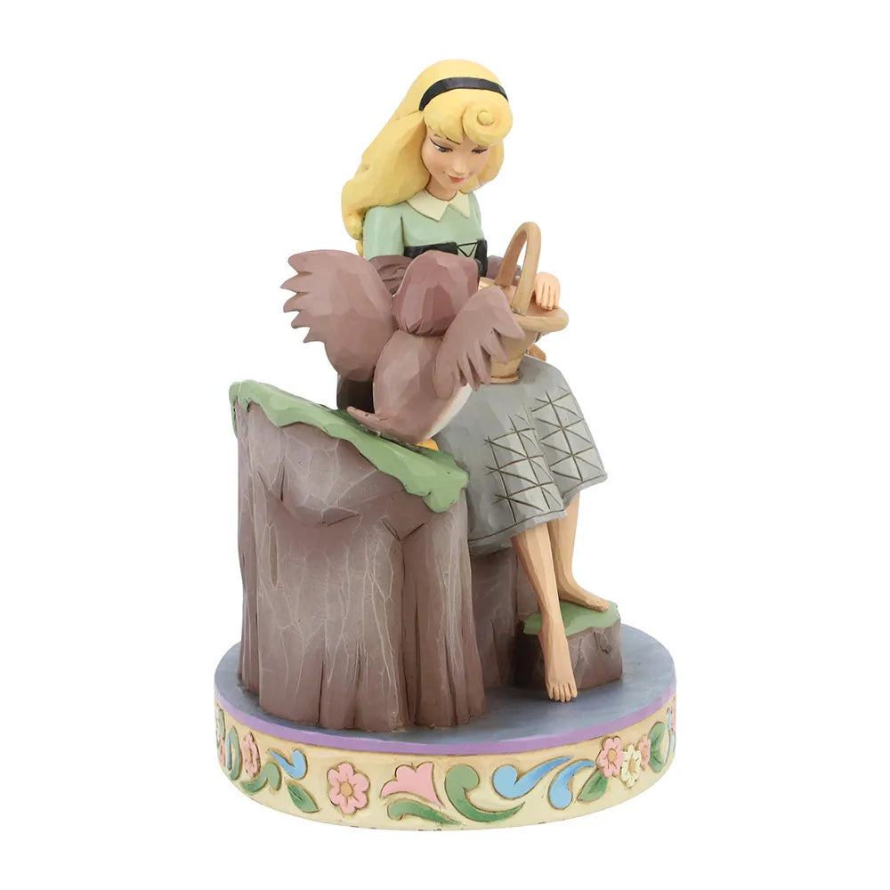 Jim Shore Sleeping Beauty figurine showing woodland animal detail