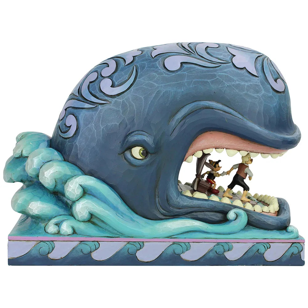 Jim Shore A Whale of a Whale figurine showing Pinocchio and Geppetto detail