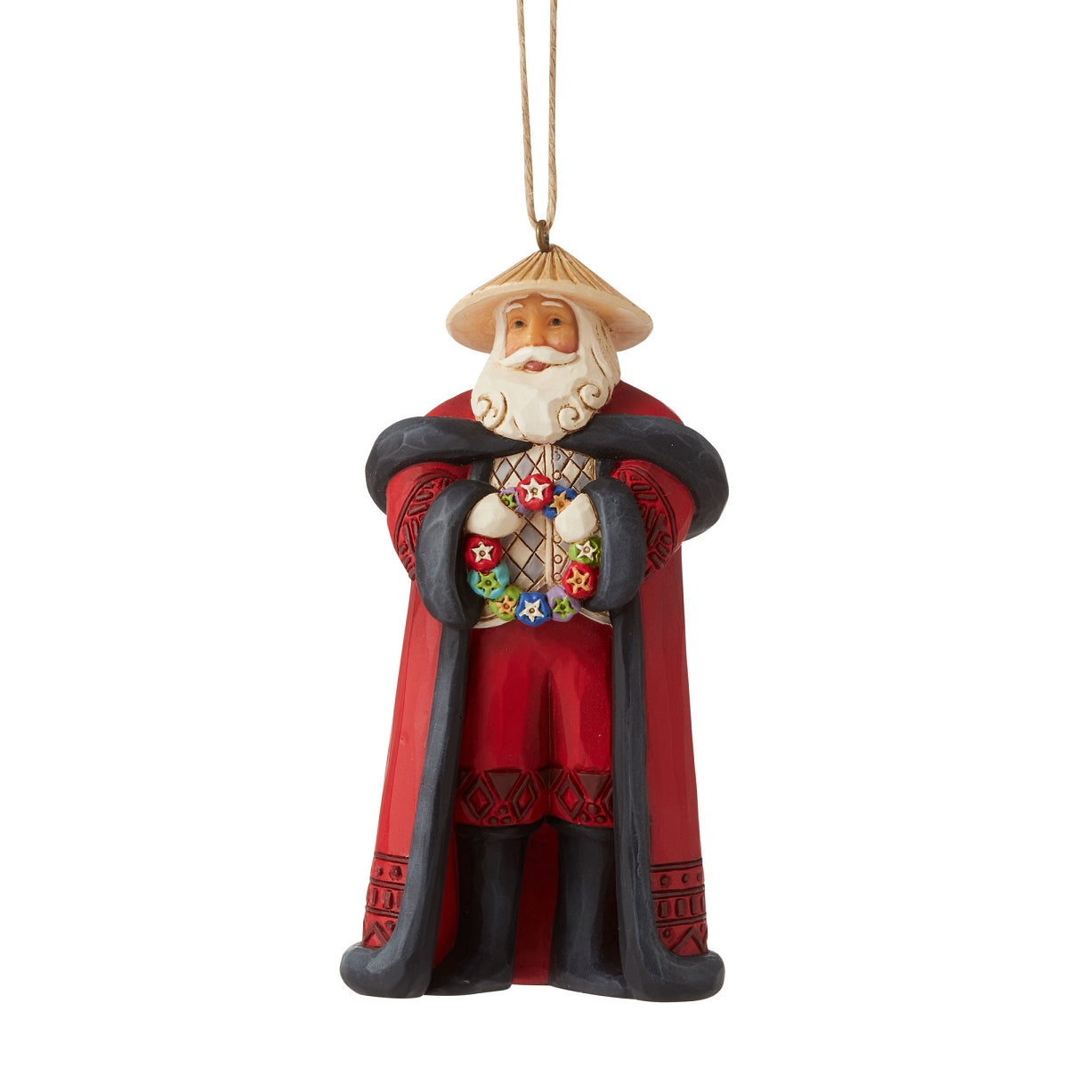 Filipino Santa holding a Capiz wreath hanging ornament